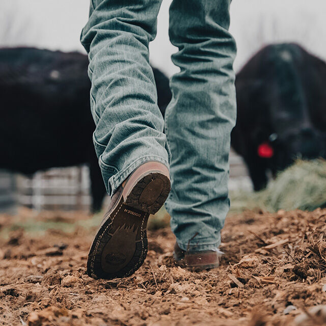 Man wears Double-H boots with I.C.E. outsoles.