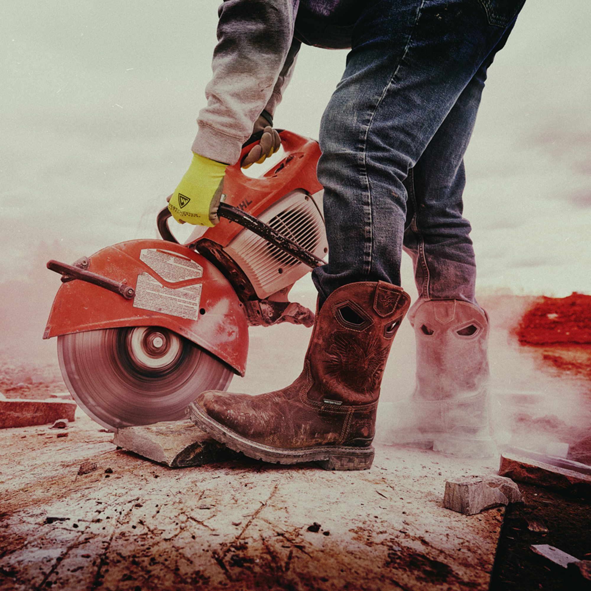 A man with a saw wearing the Dustie Comp toe in brown.