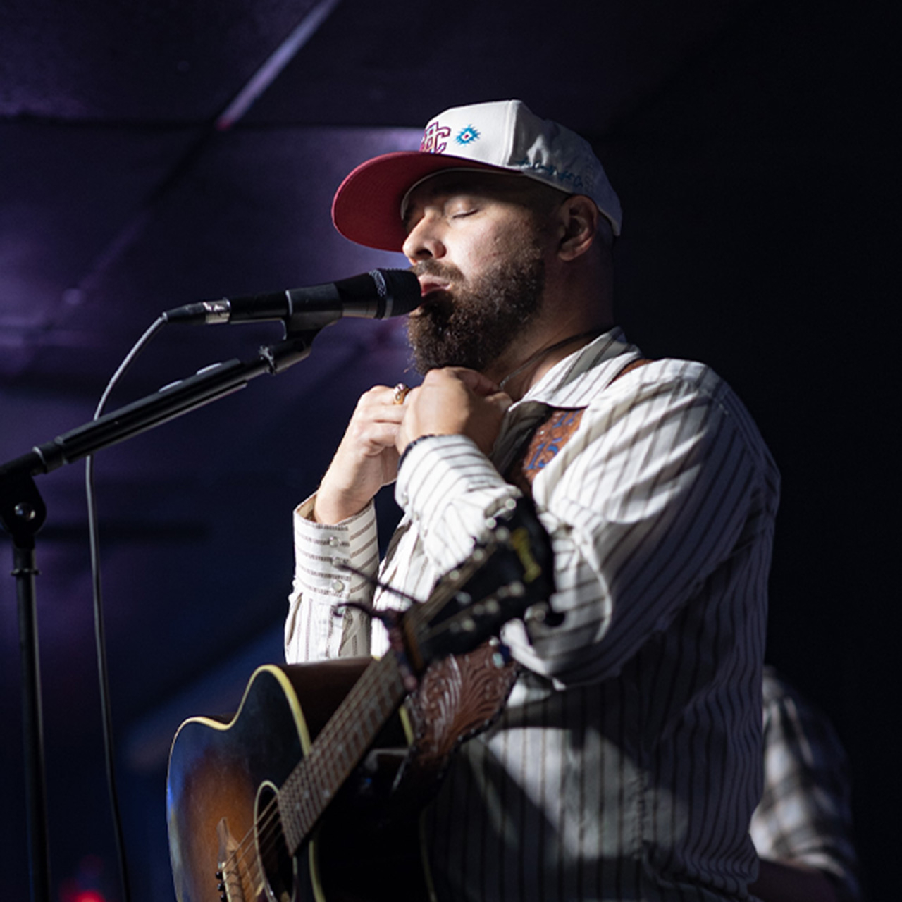 Alex Aguilar singing.