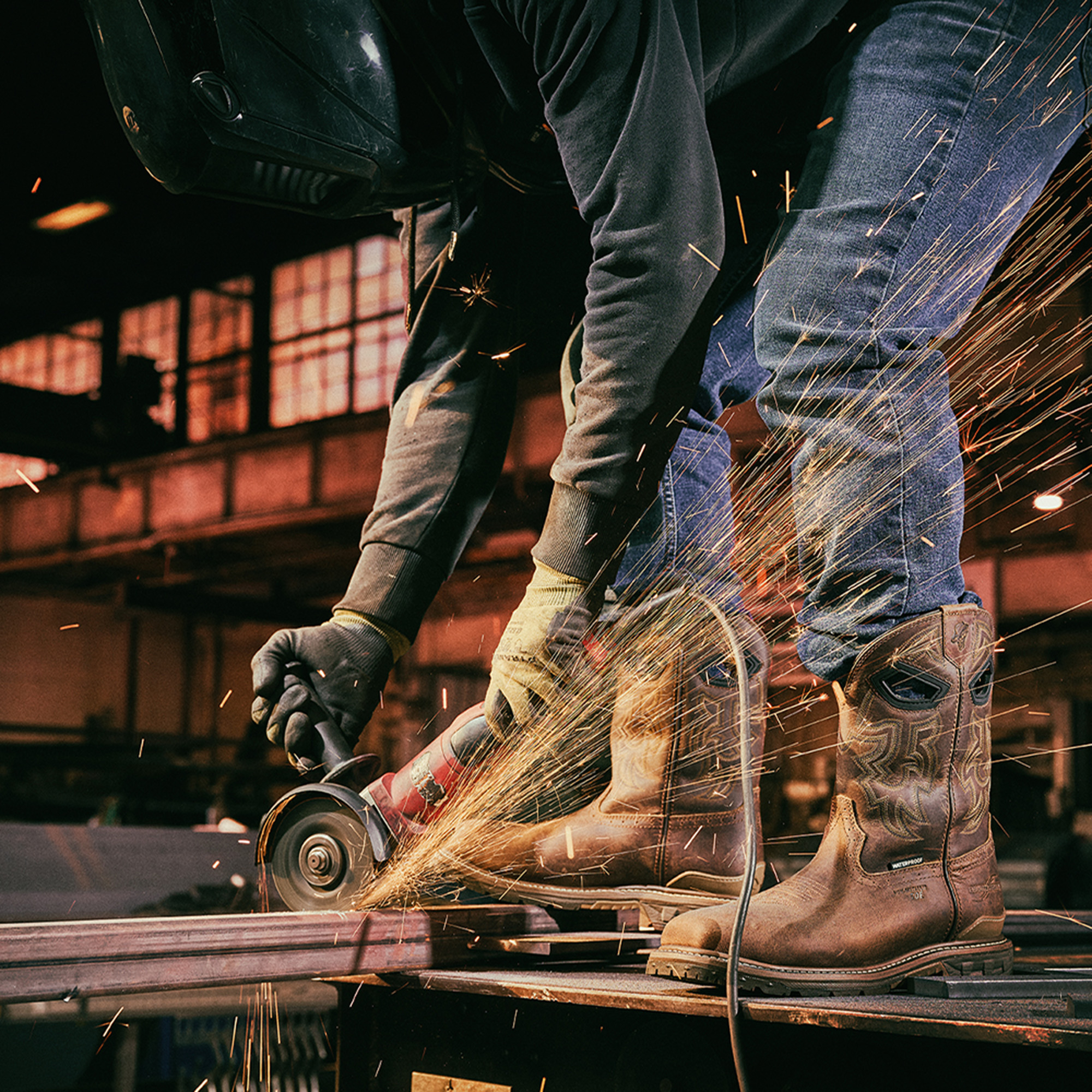 A man welding and wearing the Stanton Comp Toe in brown.