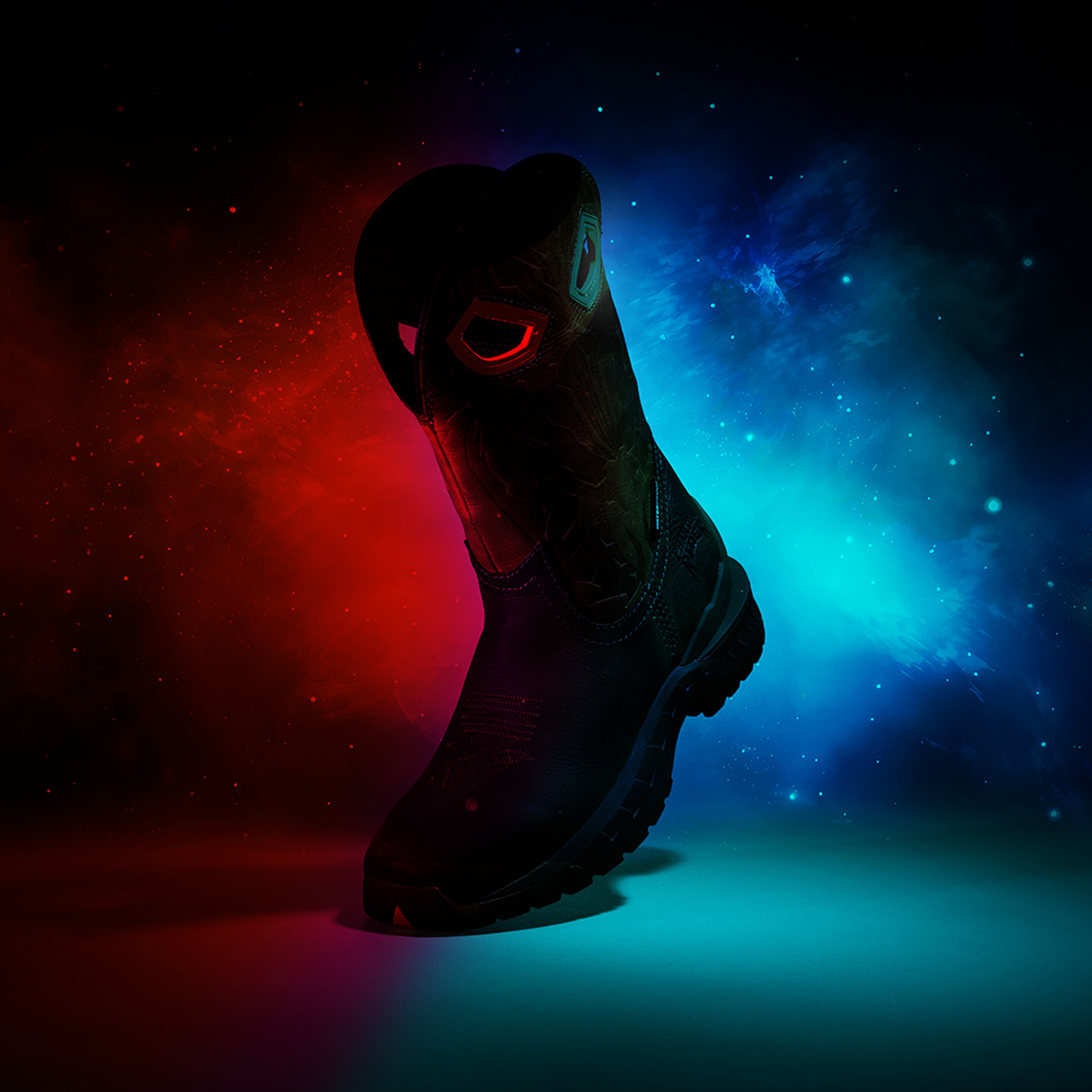 Stinger boot in brown obscured by red and blue smoke.