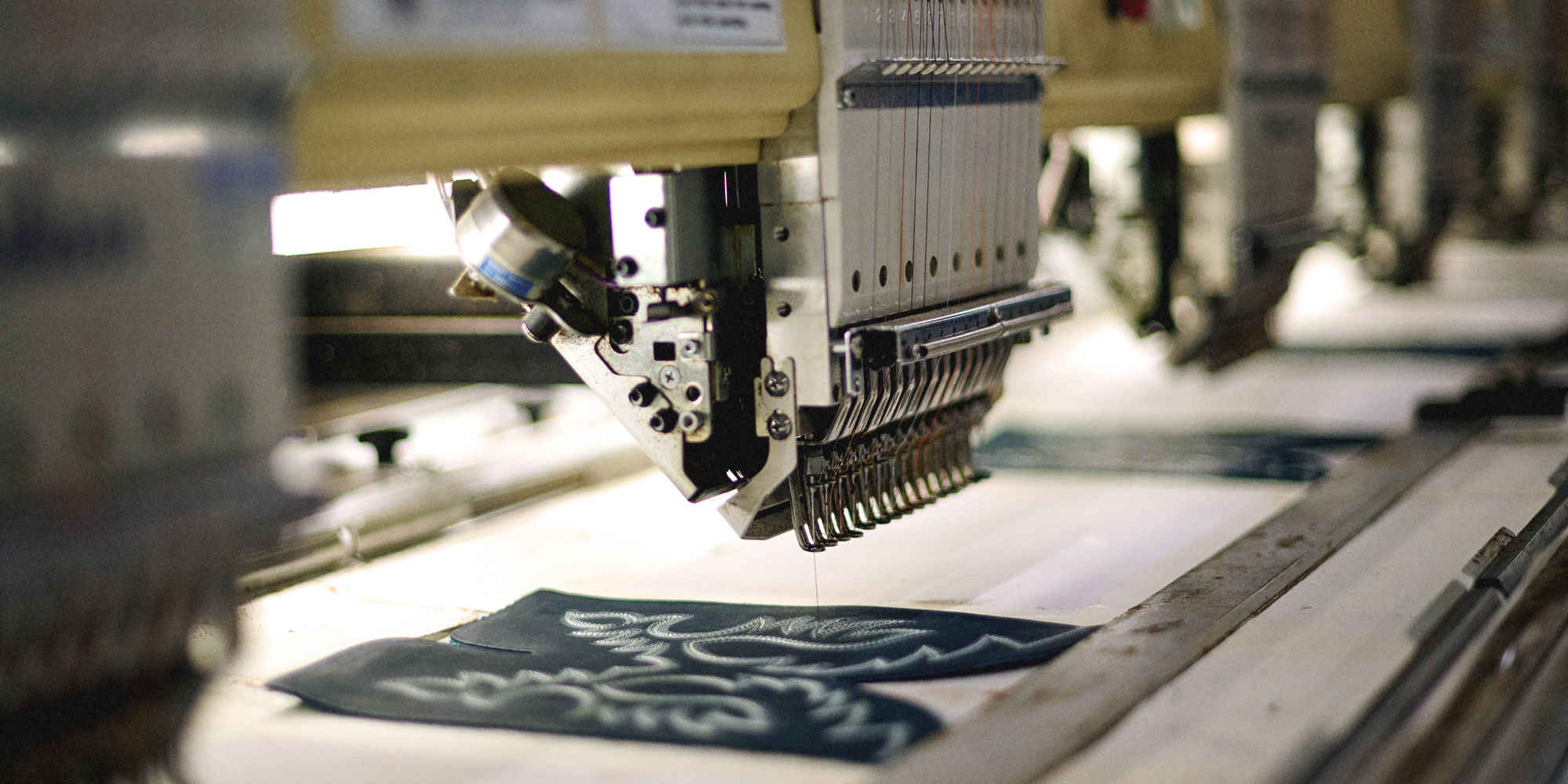 A machine in the factory making a detail for Double-H boots.