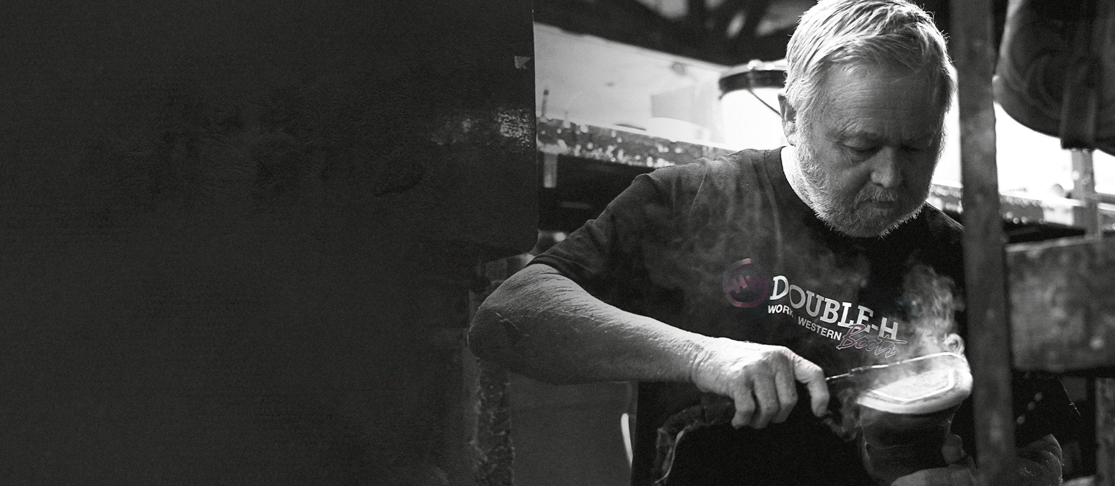 A factory worker making a Double-H boot.
